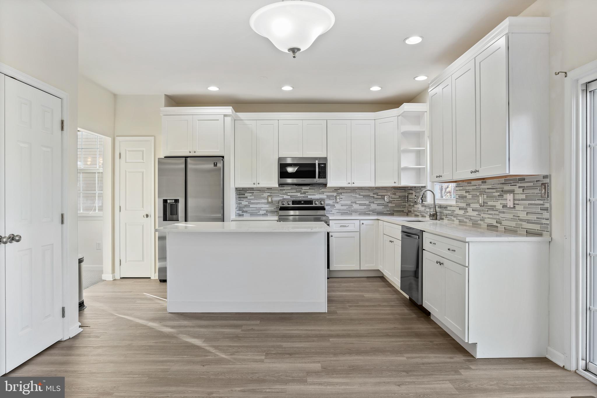 8680 Ridge Road Ellicott City, MD 21043 - Photo 8 of 43 Ktichen with gorgeous backsplash