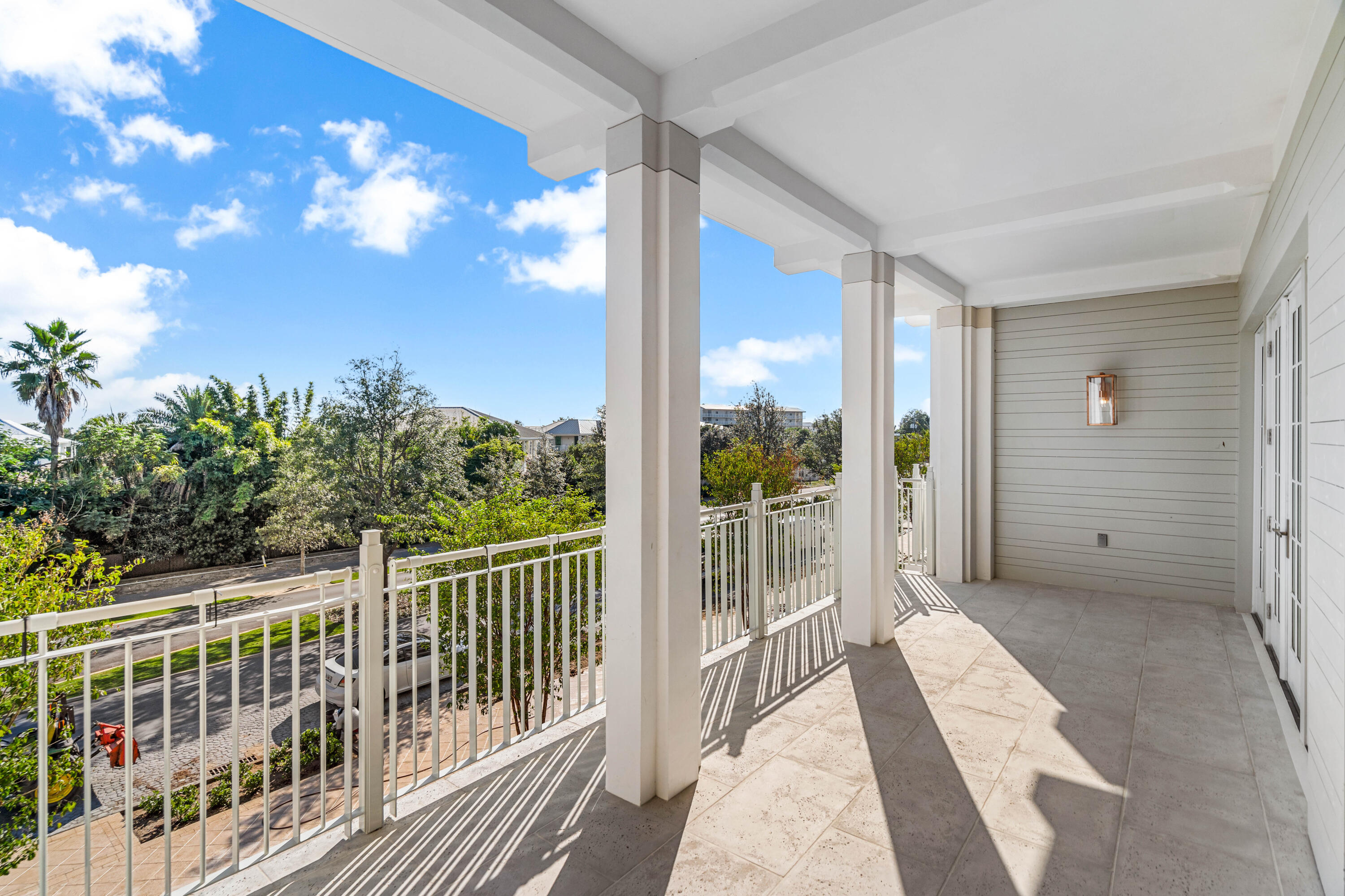a balcony view with a garden space