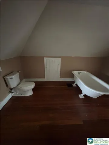 a view of workspace with lounge chair