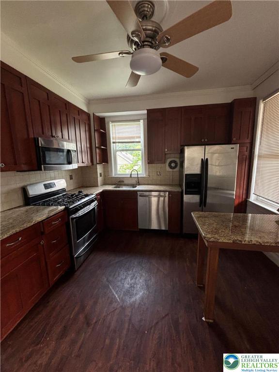 Undisclosed Address Easton, PA 18042 - Photo 9 of 9 a kitchen with stainless steel appliances granite countertop a sink a stove a refrigerator cabinets and wooden floor