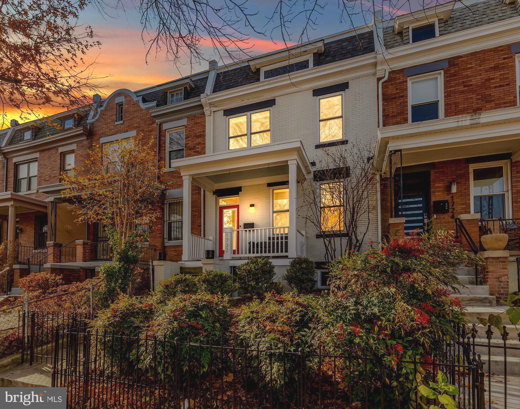 1722 2nd Street Northwest Washington, DC 20001 - Photo 1 of 33 a front view of a house with lots of trees and plants