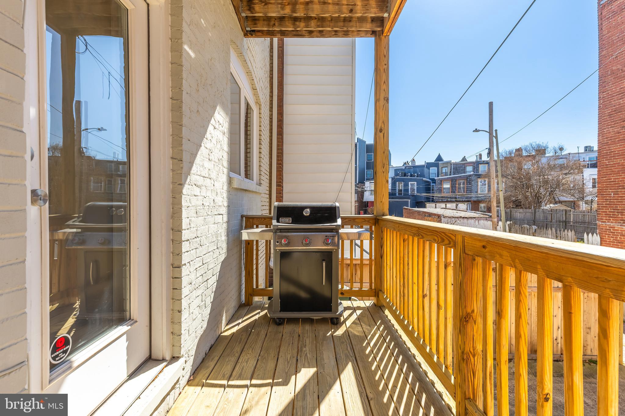 1722 2nd Street Northwest Washington, DC 20001 - Photo 13 of 33 a view of a balcony with a floor to ceiling window