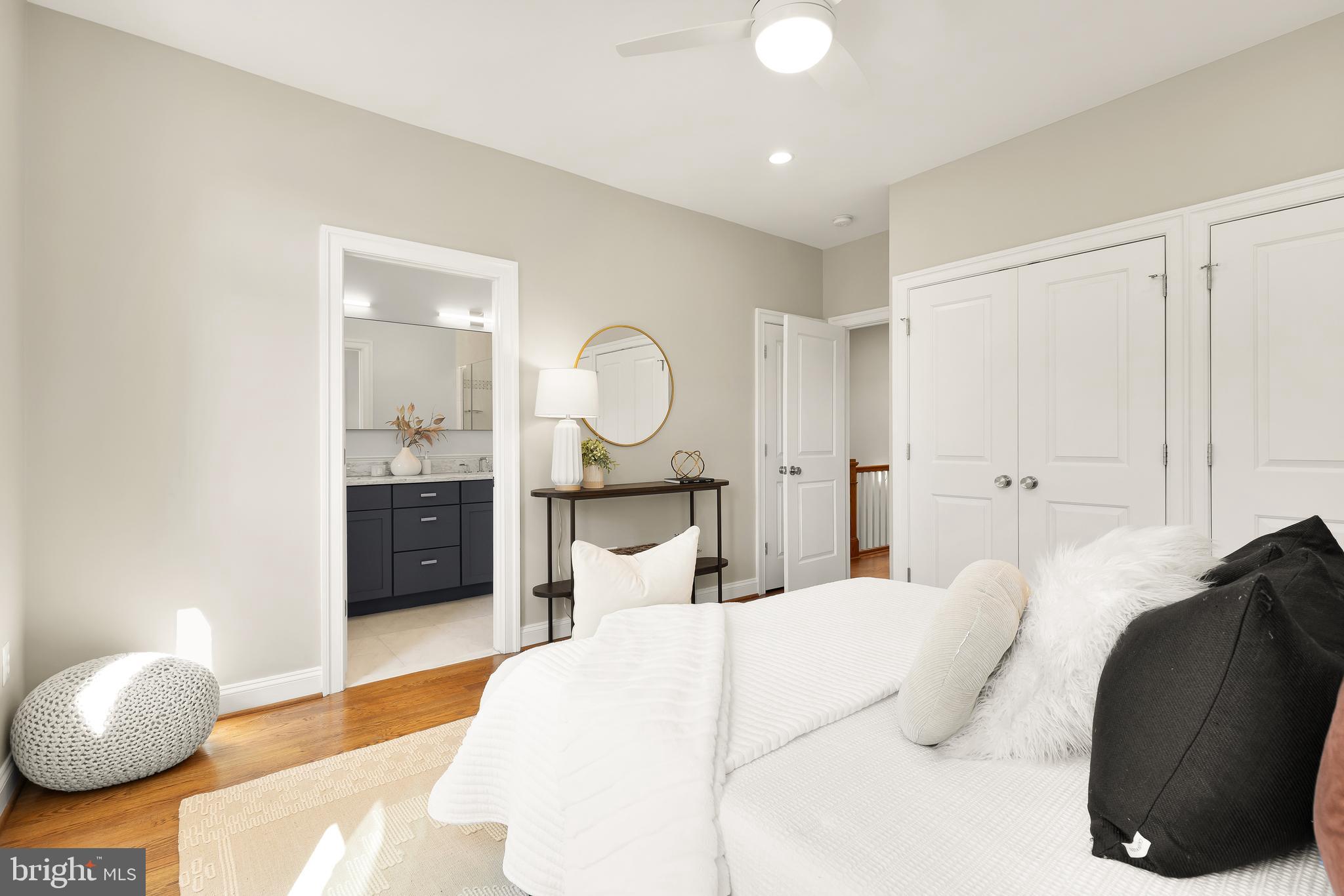 1722 2nd Street Northwest Washington, DC 20001 - Photo 15 of 33 a bed room with a bed and a chair