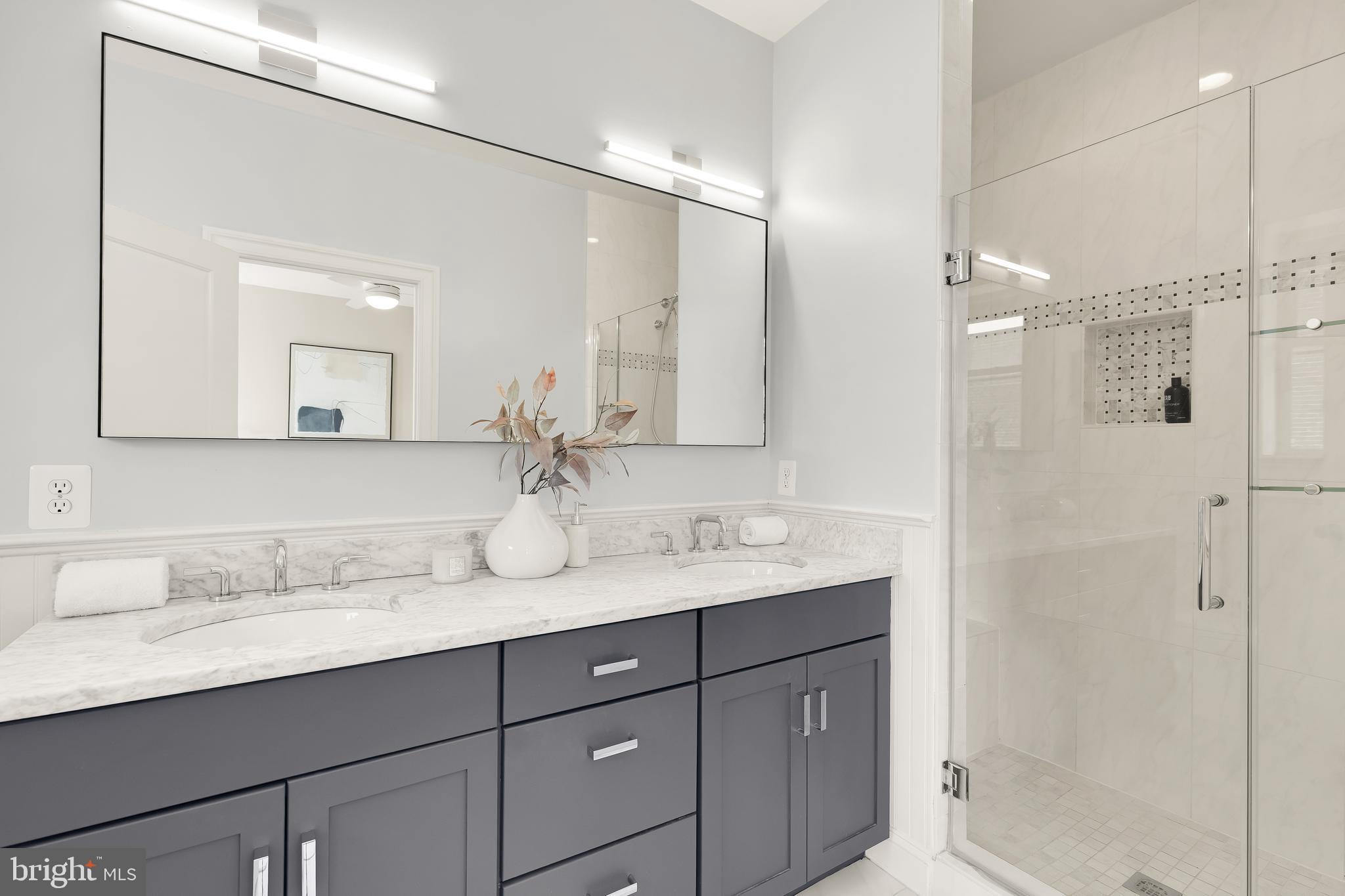 1722 2nd Street Northwest Washington, DC 20001 - Photo 16 of 33 a bathroom with a granite countertop sink mirror and double