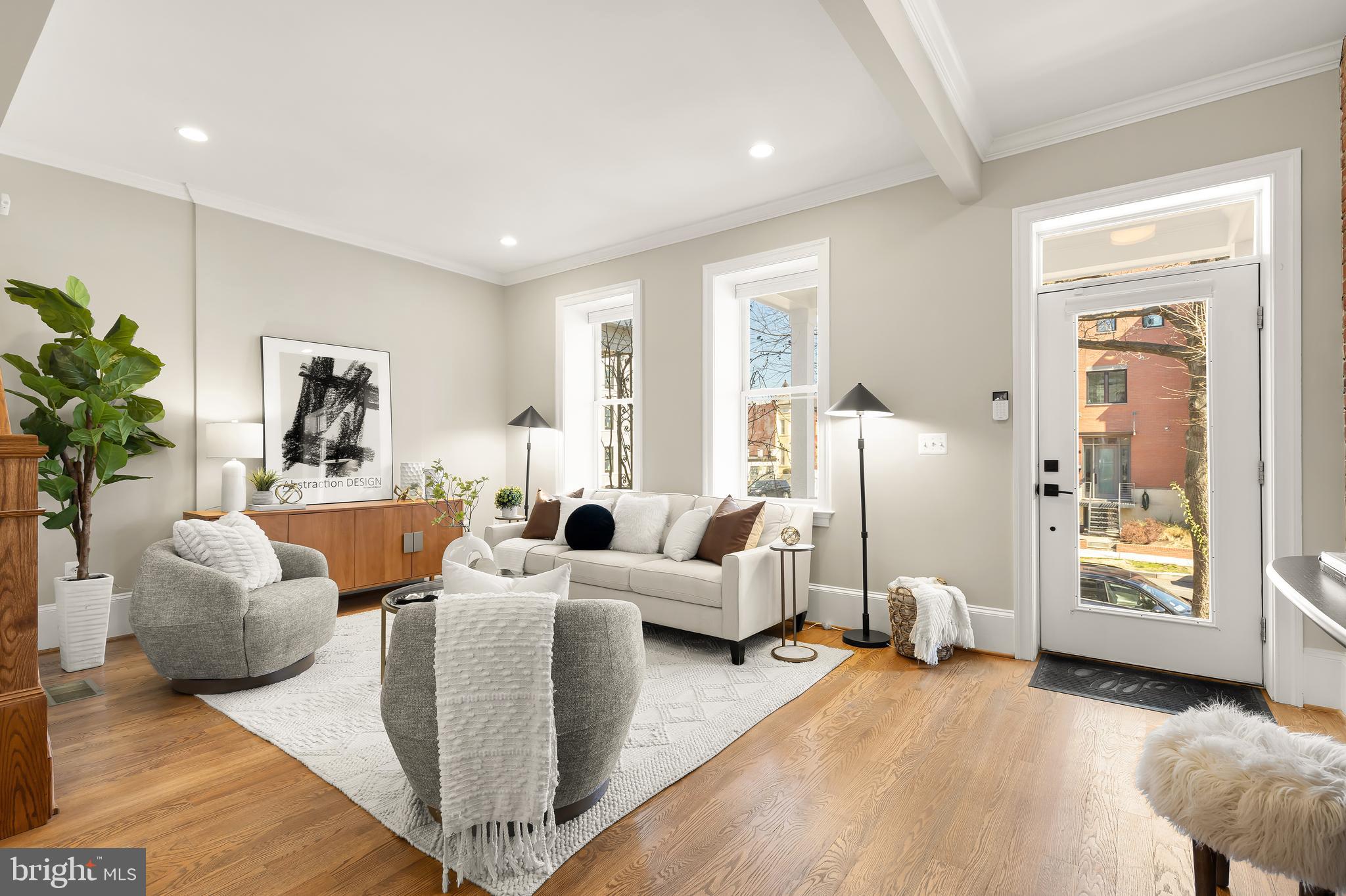 1722 2nd Street Northwest Washington, DC 20001 - Photo 4 of 33 a living room with furniture and a large window