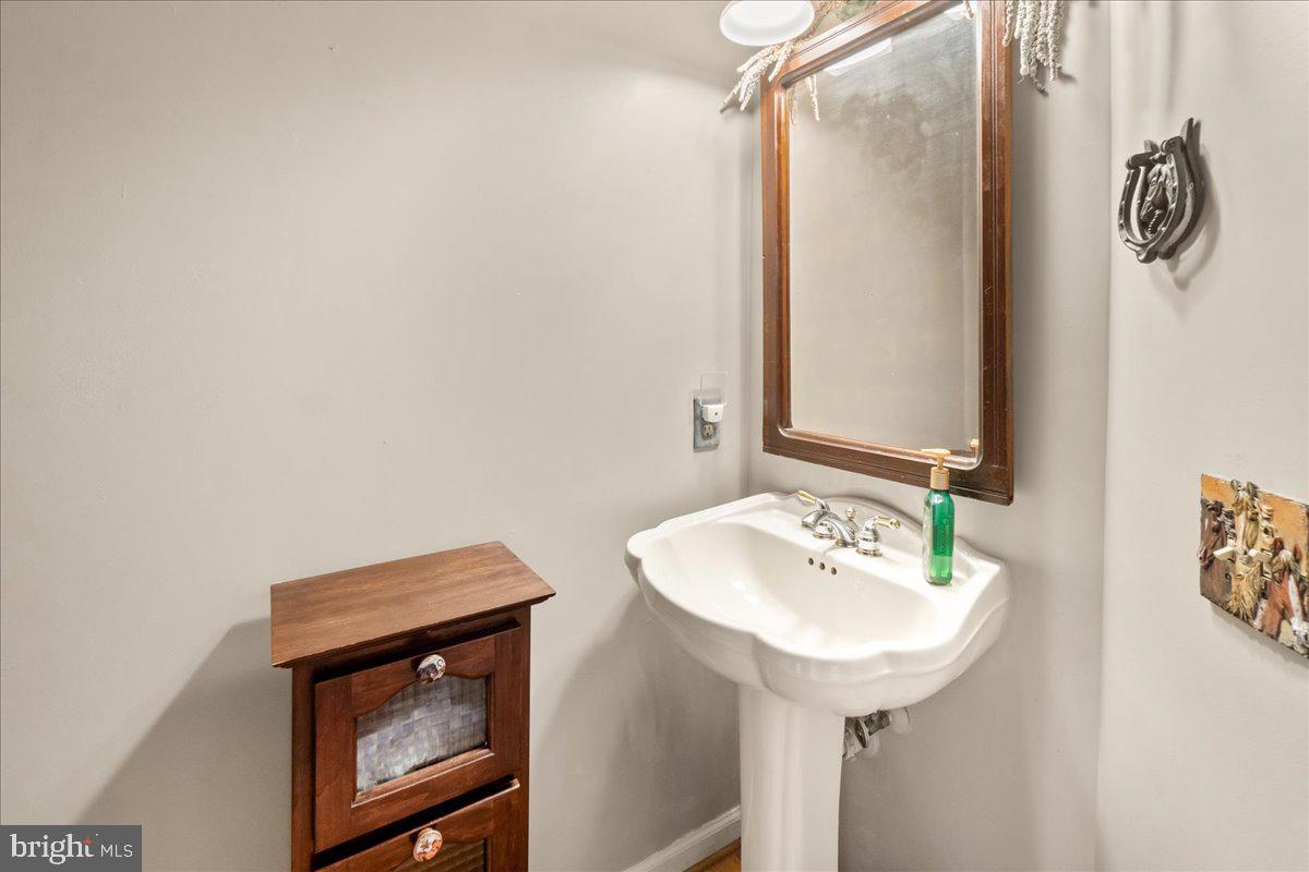 5751 Mountville Road Adamstown, MD 21710 - Photo 28 of 72 half bath off kitchen & attached garage entrance
