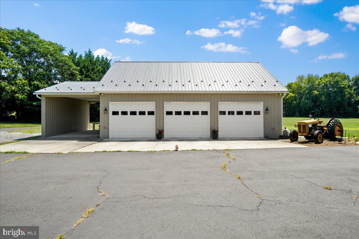 5751 Mountville Road Adamstown, MD 21710 - Photo 62 of 72 3 car garage with hang over for horse trailer