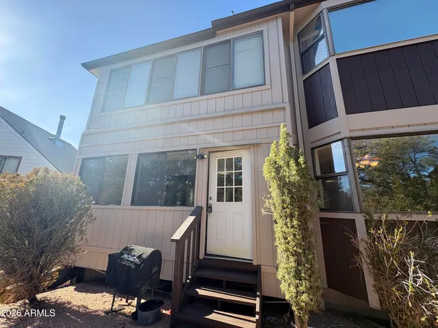 a view of a house with a small porch