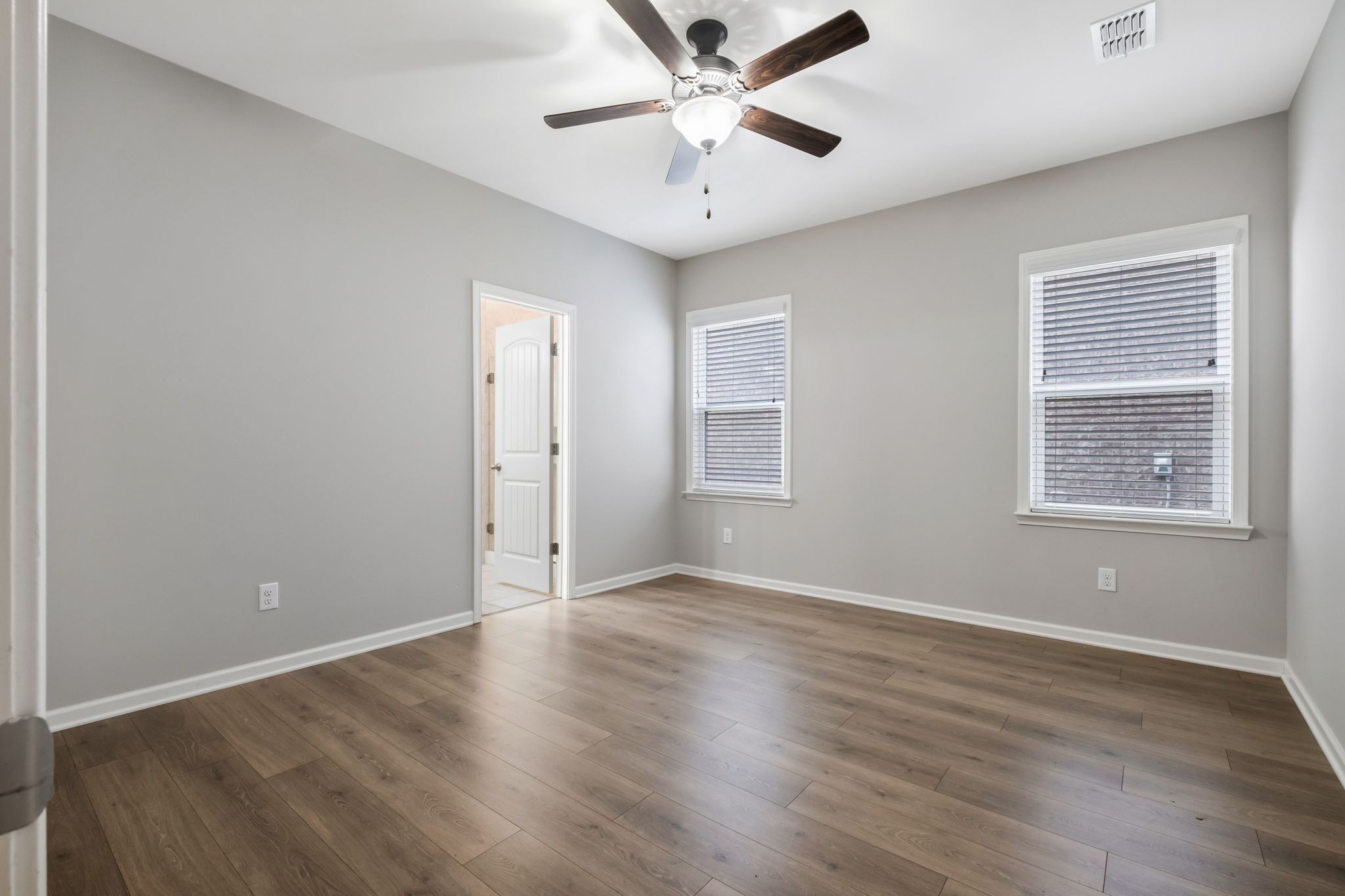 3721 Hoggett Ford Road Hermitage, TN 37076 - Photo 17 of 31 wooden floor in an empty room with a window