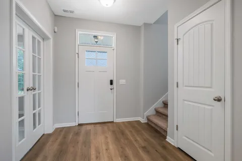 a view of an entryway with hallway