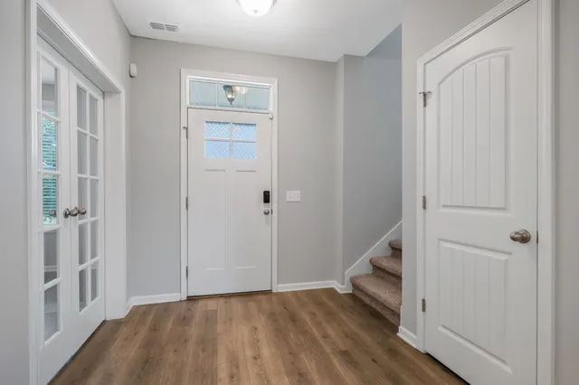 a view of an entryway with hallway