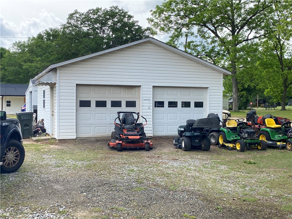 3 Heyward Avenue Honea Path, SC 29654 - Photo 30 of 35 This functional garage offers ample space and convenient access for all your storage needs.