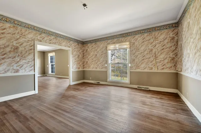 a kitchen with a sink stove and refrigerator