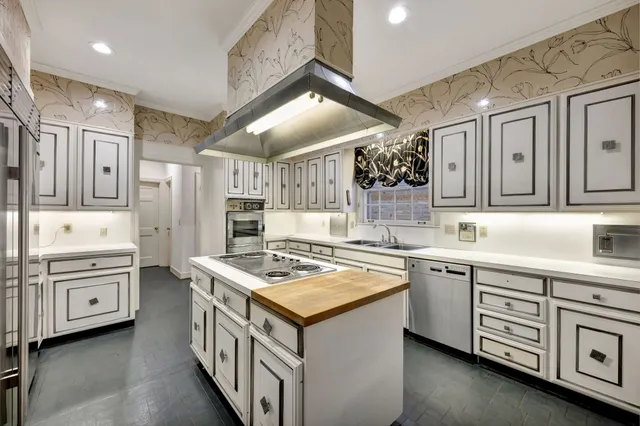 a view of an empty room with glass door and a window