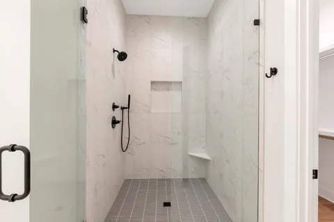 a bathroom with a sink vanity and a mirror