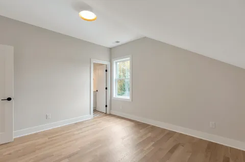 a white stove top oven sitting inside of a kitchen