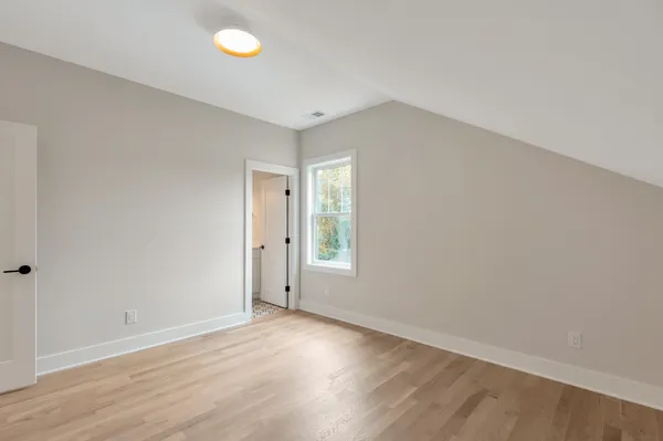 a white stove top oven sitting inside of a kitchen
