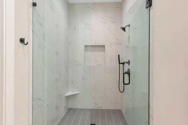 a bathroom with a sink vanity and a mirror