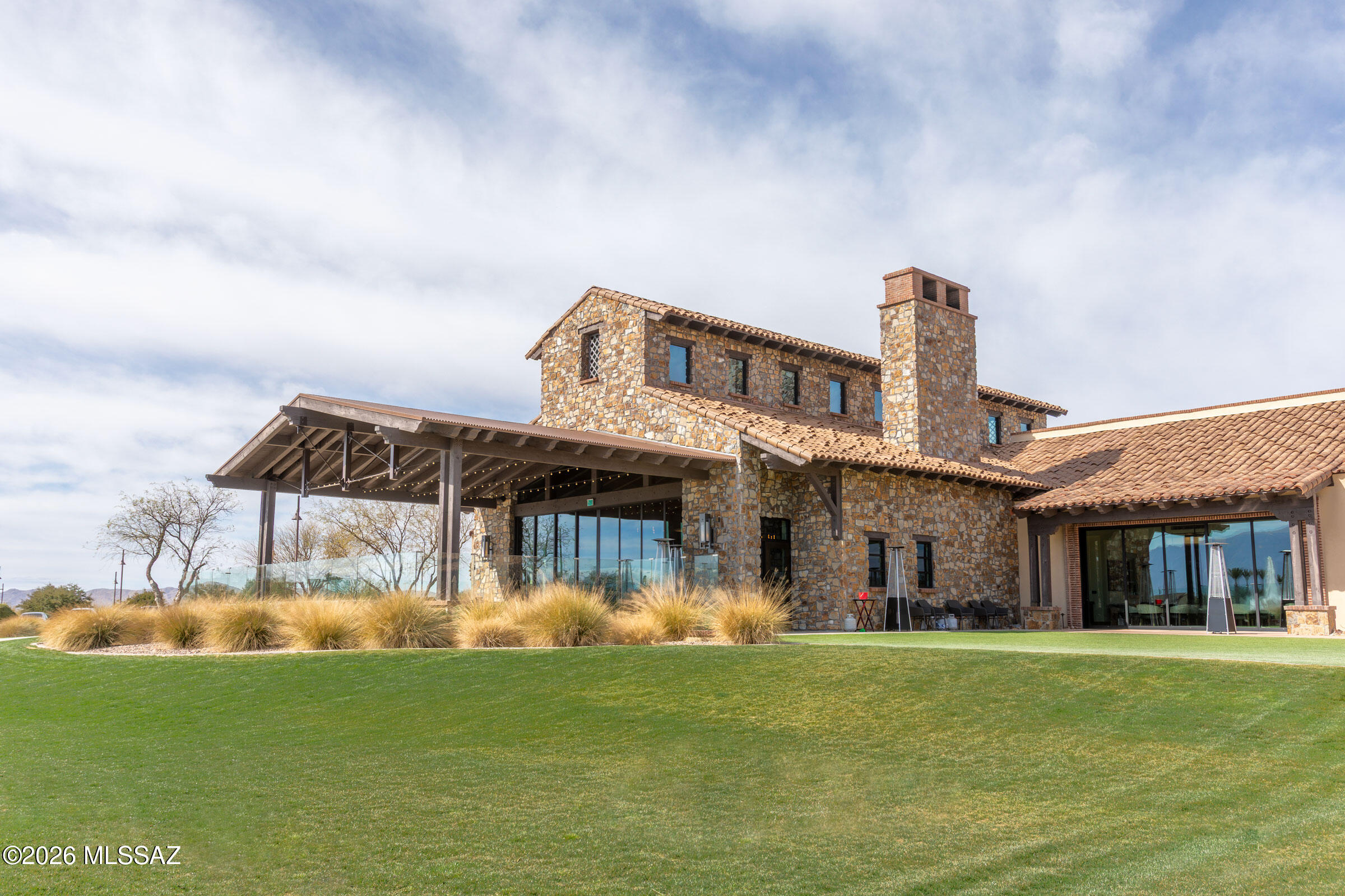 61460 East Shale Road Oracle, AZ 85623 - Photo 33 of 33 a front view of a house with a garden