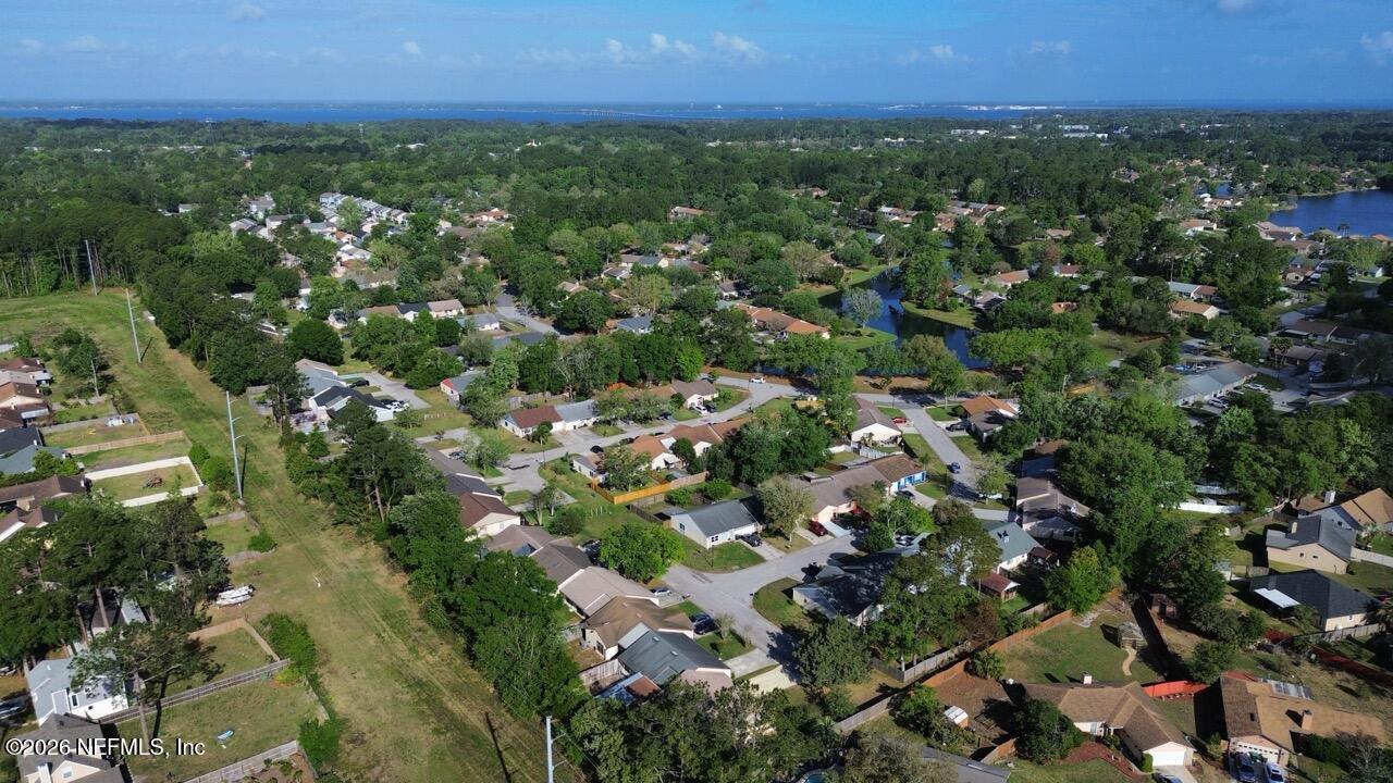 11432 Godfrey Way Jacksonville, FL 32223 - Photo 18 of 18 an aerial view of residential house with outdoor space and trees all around