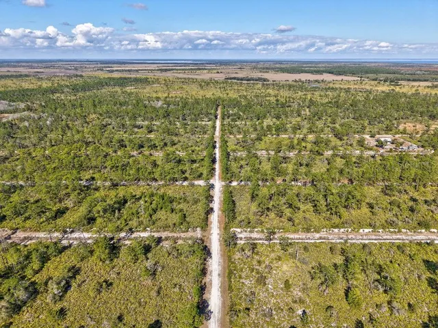 a view of a city with an ocean beach
