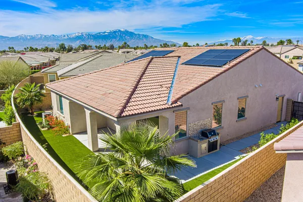 a view of a house with a patio
