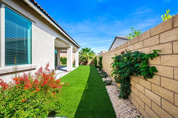 an empty room with a empty space and a ceiling fan