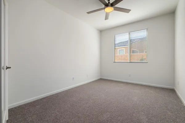 a utility room with sink dryer and washer