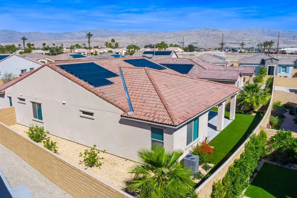 a view of hallway with wooden floor