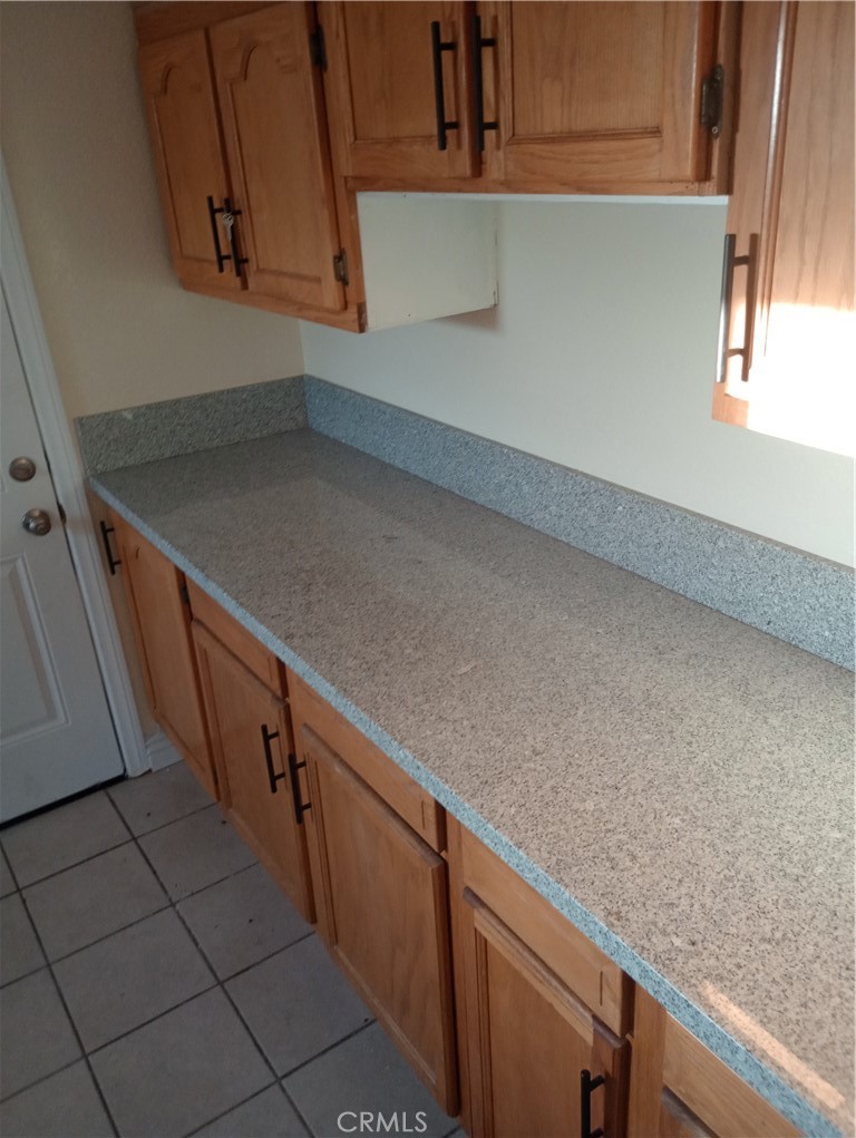 1426 Riverside Drive Barstow, CA 92311 - Photo 16 of 19 a hallway with stairs