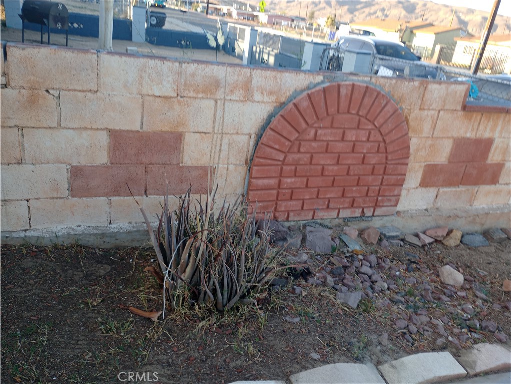 1426 Riverside Drive Barstow, CA 92311 - Photo 2 of 19 a view of entrance gate of a house