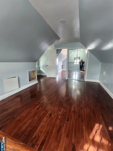 a view of interior space with wooden floor