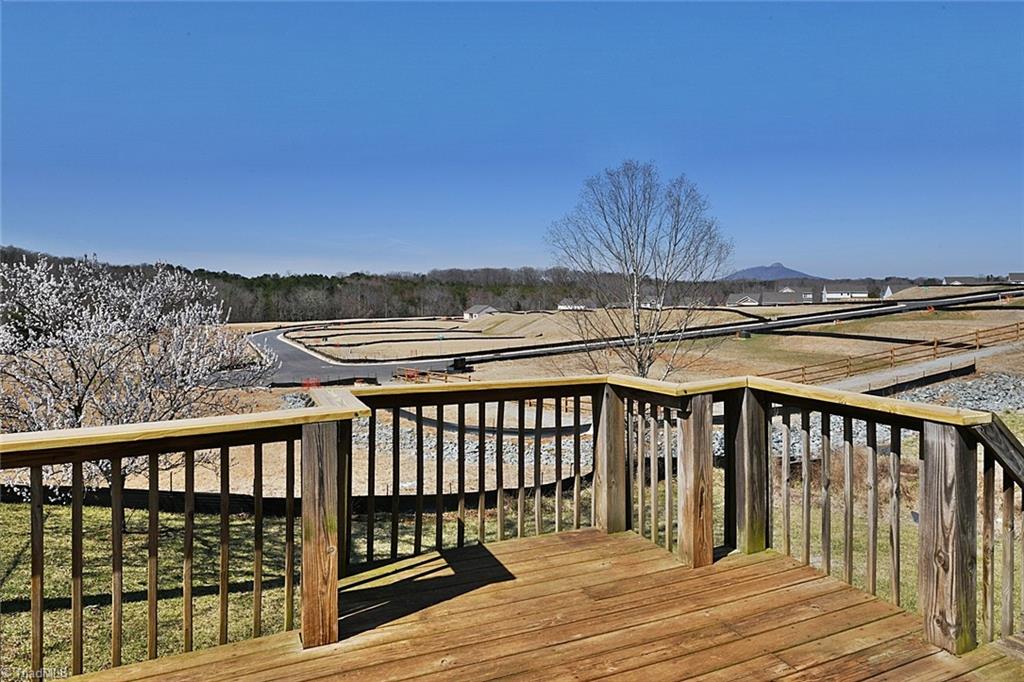 128 Lynne Avenue King, NC 27021 - Photo 24 of 27 Deck Connects to Dog Run for Convenience