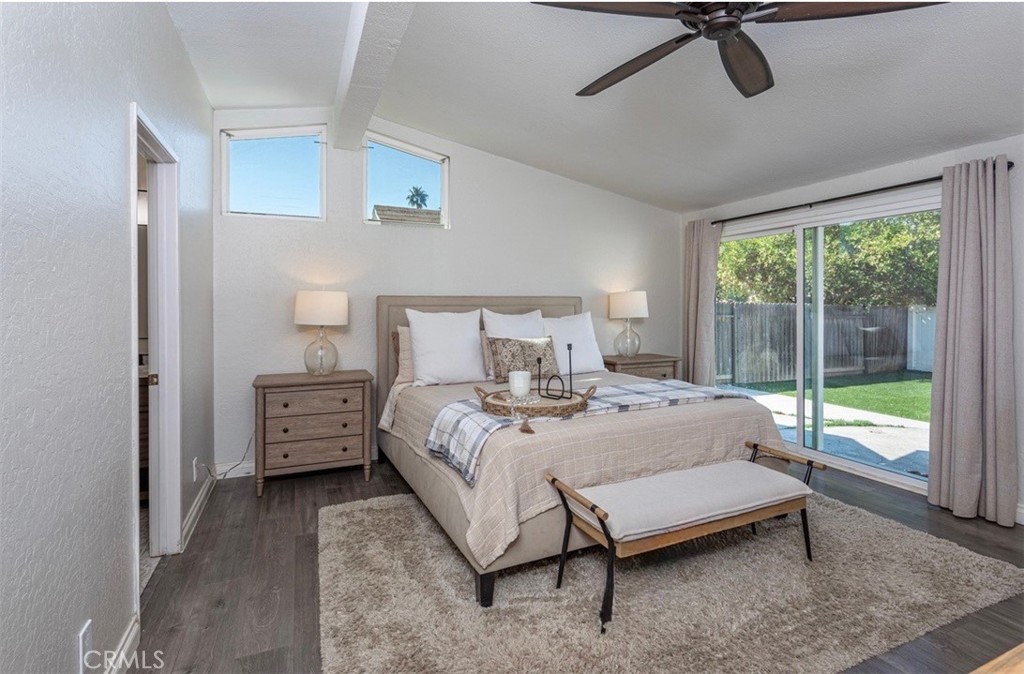 27568 Ruby Lane Castaic, CA 91384 - Photo 16 of 34 a bed room with a bed and wooden floor