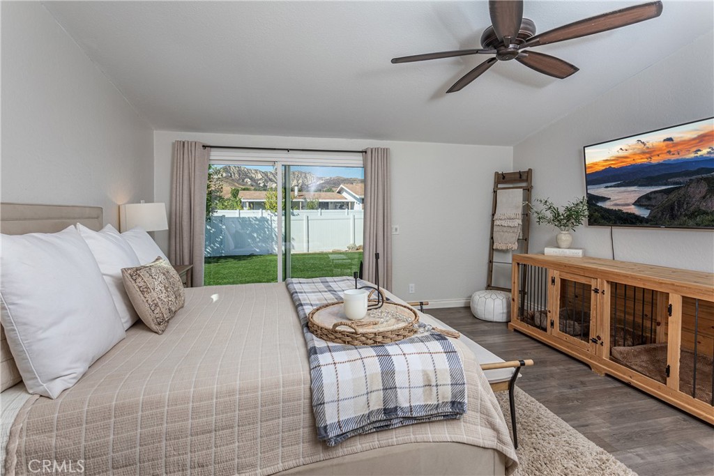 27568 Ruby Lane Castaic, CA 91384 - Photo 17 of 34 a living room with furniture and a flat screen tv