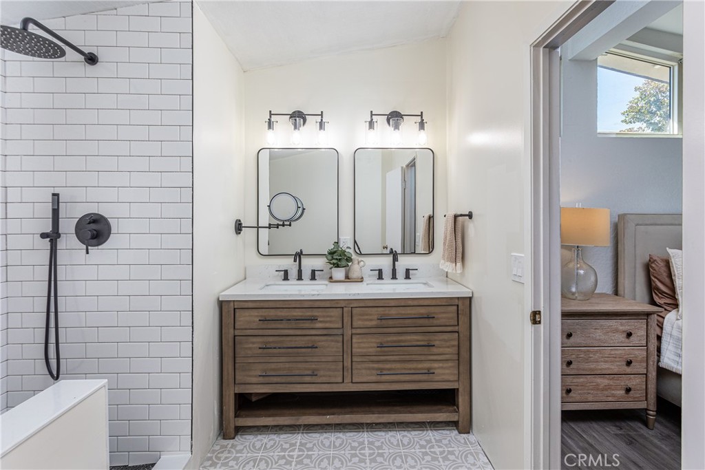 27568 Ruby Lane Castaic, CA 91384 - Photo 18 of 34 a bathroom with a sink vanity and mirror