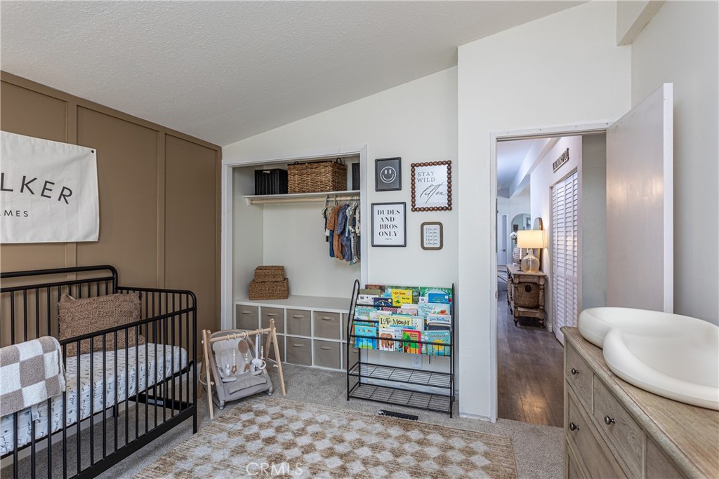 27568 Ruby Lane Castaic, CA 91384 - Photo 20 of 34 a bedroom with furniture and a window