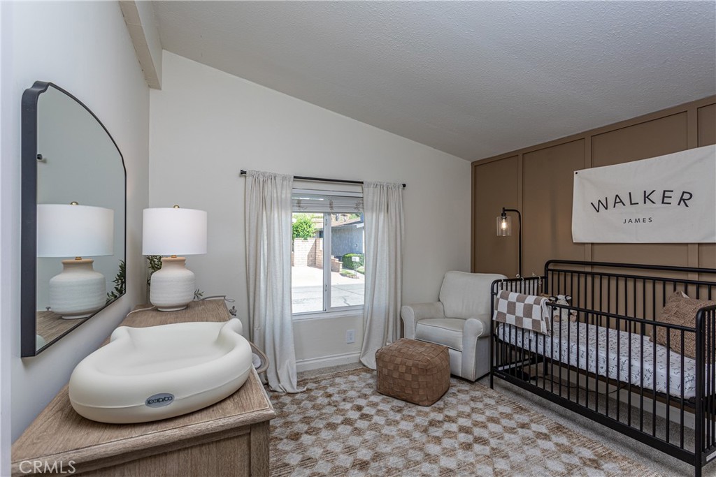 27568 Ruby Lane Castaic, CA 91384 - Photo 21 of 34 a bedroom with furniture and a window