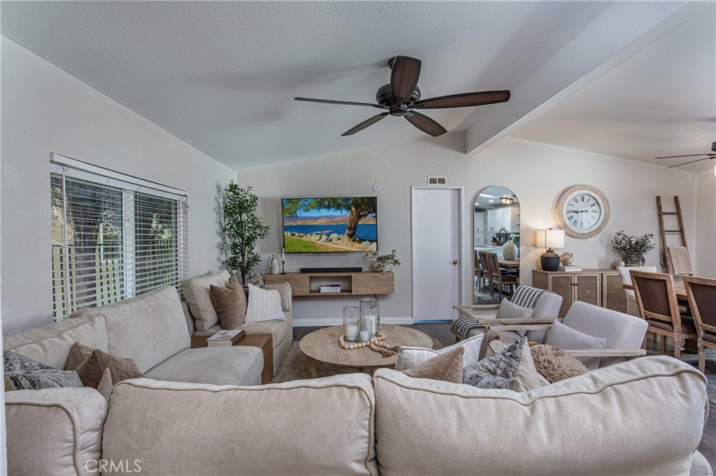 27568 Ruby Lane Castaic, CA 91384 - Photo 6 of 34 a living room with furniture and a flat screen tv