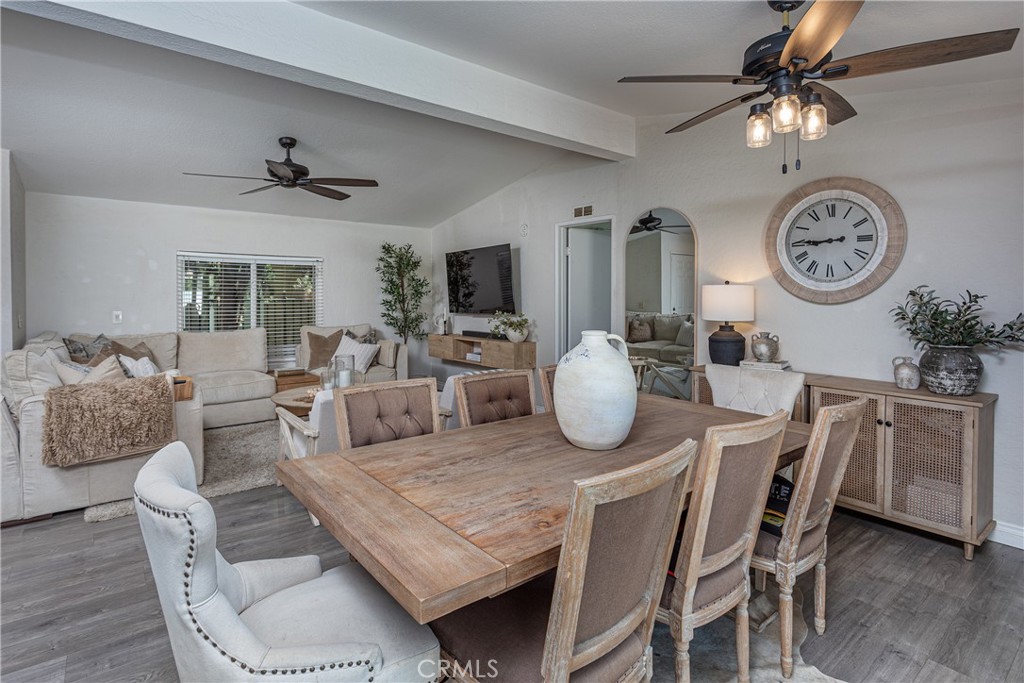 27568 Ruby Lane Castaic, CA 91384 - Photo 9 of 34 a living room with furniture a clock and a window