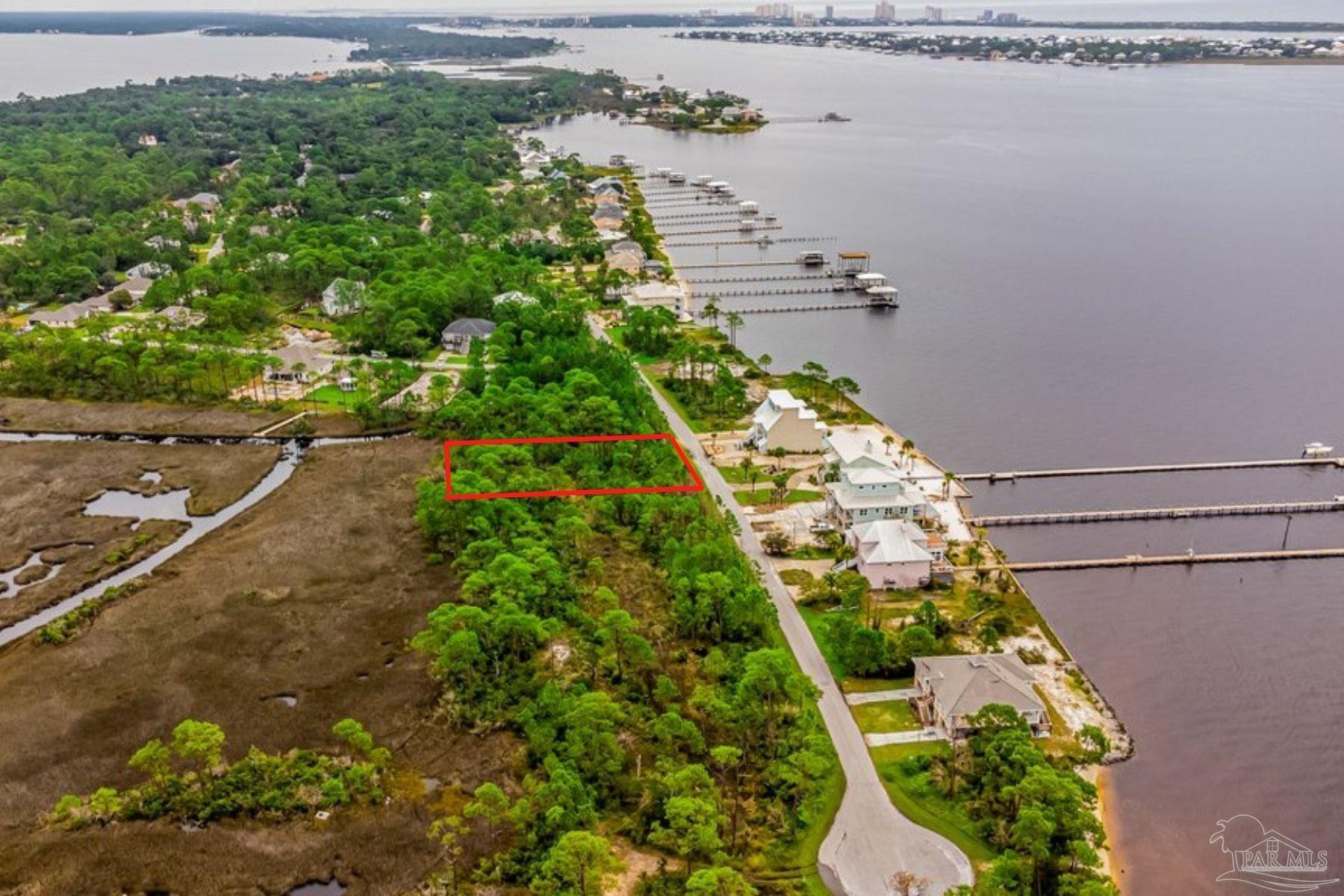 5931 Red Cedar Street Pensacola, FL 32507 - Photo 3 of 15 a view of a yard with plants