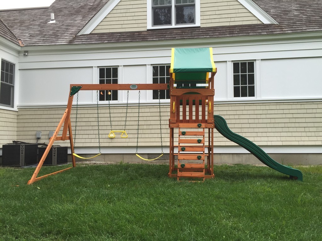 66 Arnold Road Wellesley, MA 02481 - Photo 11 of 13 a front view of a house with garden