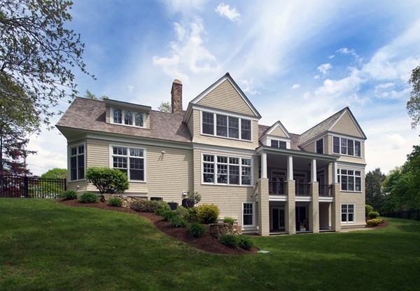 66 Arnold Road Wellesley, MA 02481 - Photo 12 of 13 a front view of a house with a yard