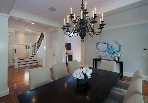 66 Arnold Road Wellesley, MA 02481 - Photo 3 of 13 a view of a dining room with furniture a chandelier and wooden floor