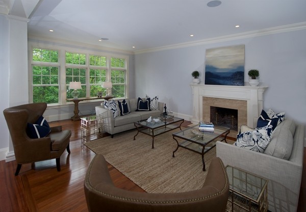 66 Arnold Road Wellesley, MA 02481 - Photo 4 of 13 a living room with furniture and a fireplace