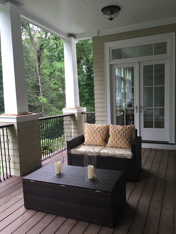 66 Arnold Road Wellesley, MA 02481 - Photo 10 of 13 a view of a roof deck with couches