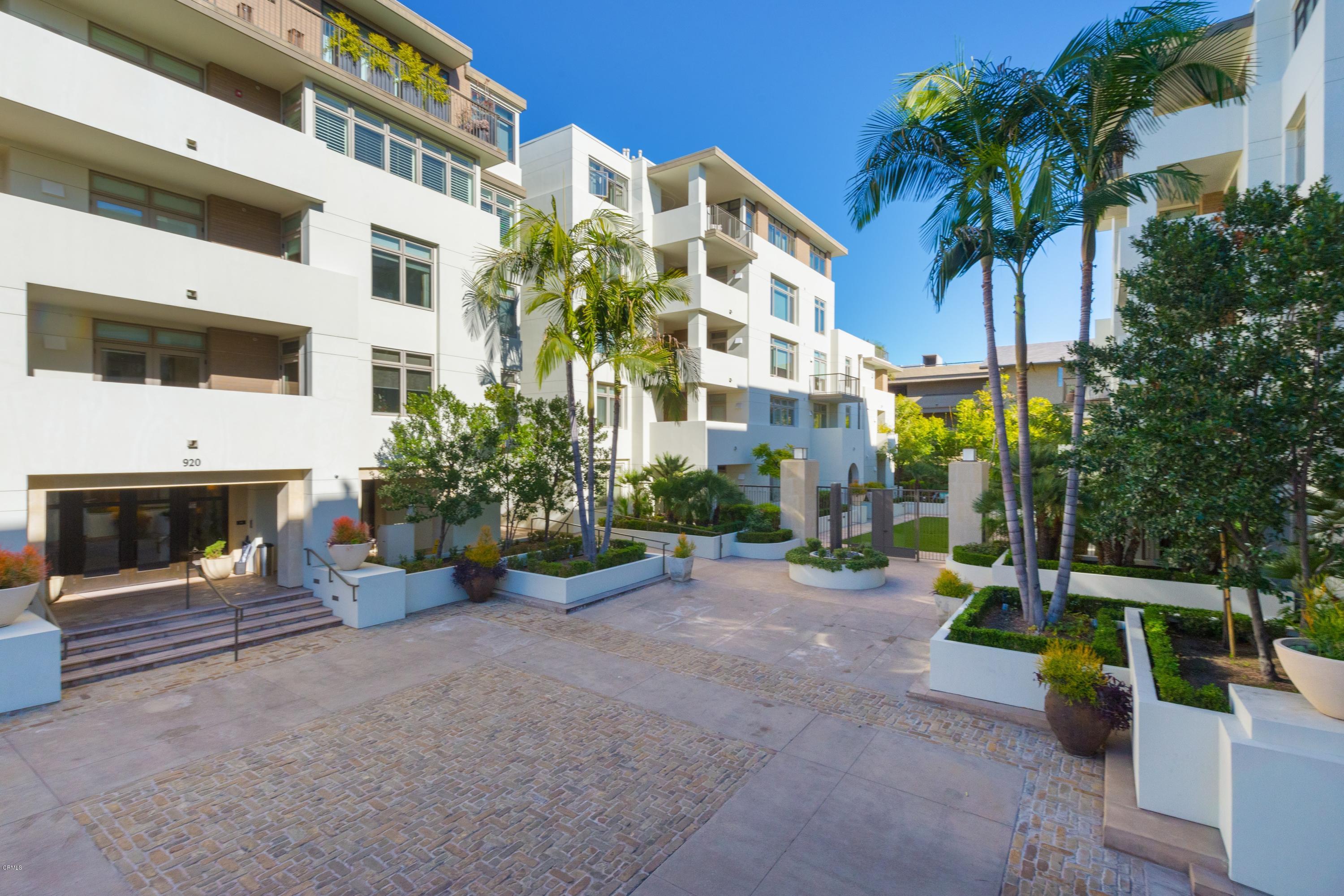 a view of a building with a garden