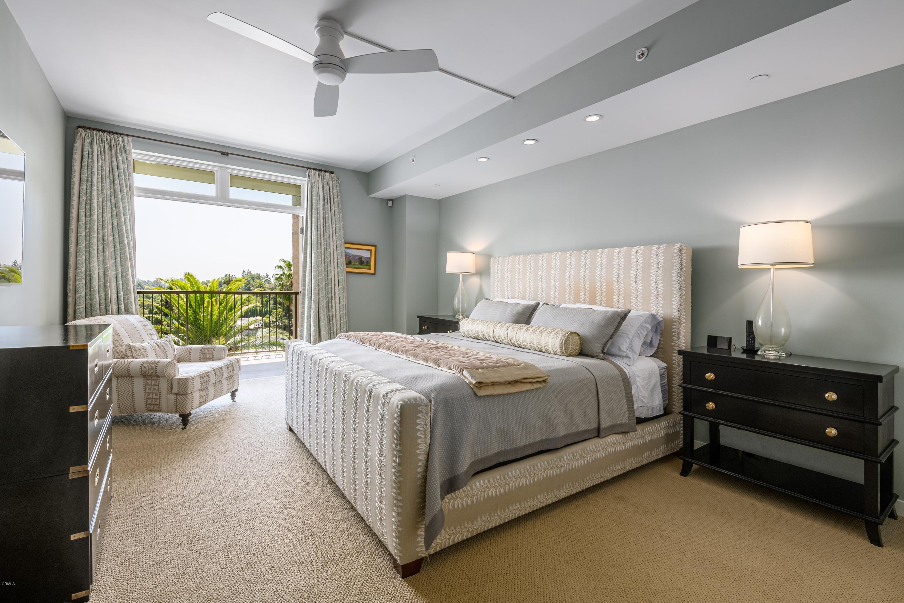 920 Granite Drive, Unit 509 Pasadena, CA 91101 - Photo 13 of 26 a spacious bedroom with a bed and a couch