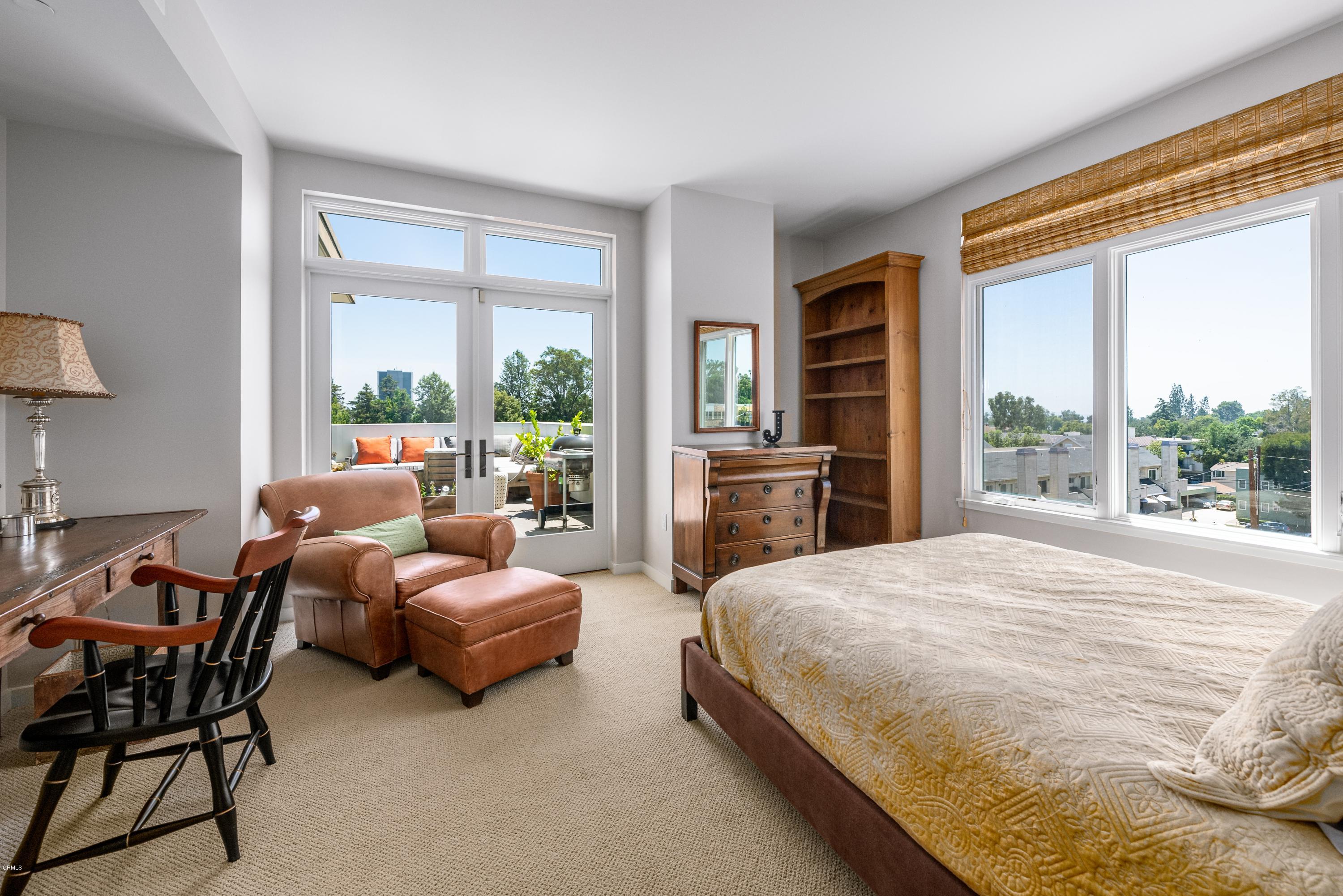 920 Granite Drive, Unit 509 Pasadena, CA 91101 - Photo 18 of 26 a bedroom with a bed and a couch