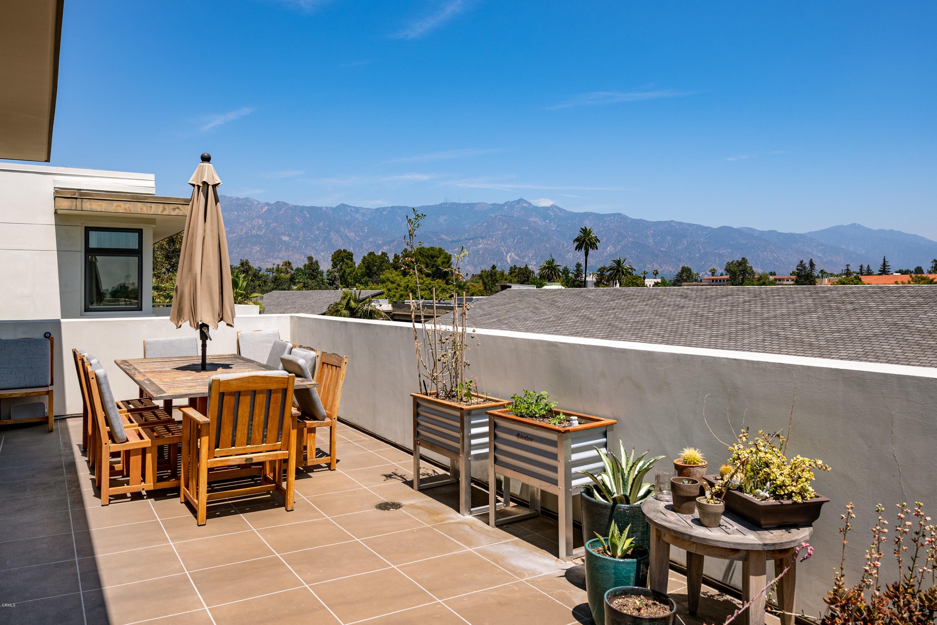 920 Granite Drive, Unit 509 Pasadena, CA 91101 - Photo 20 of 26 a view of a terrace with furniture